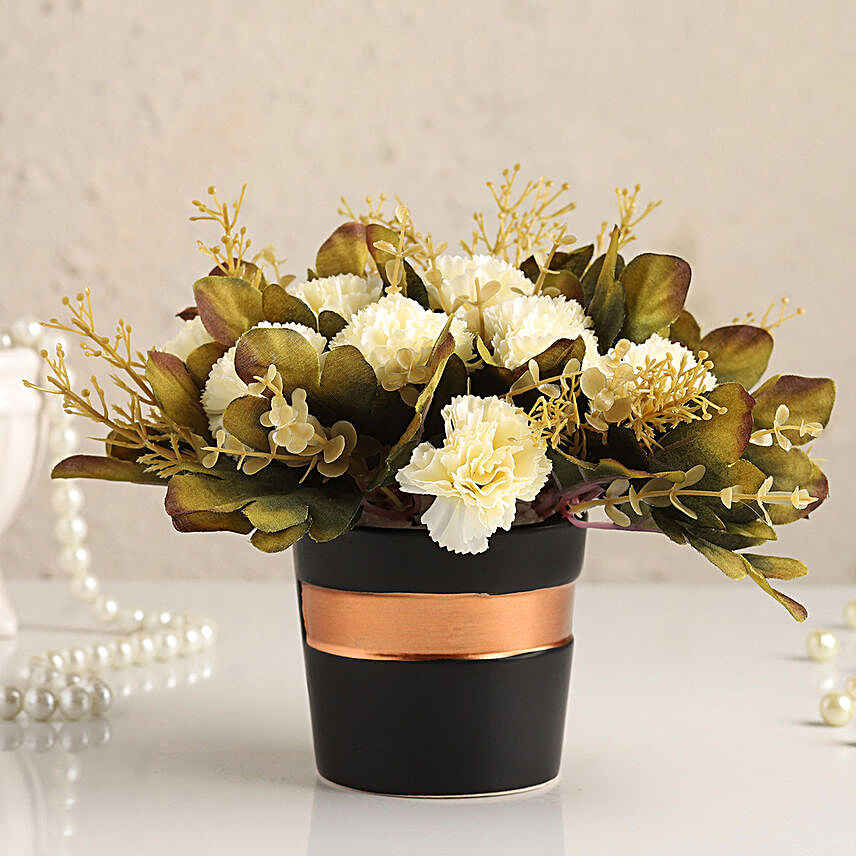 Artificial White Carnations In Black Pot