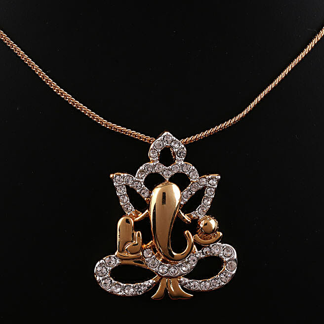 Buy/Send Gold Plated Ganesha Pendant Capsule Rakhi Online- FNP