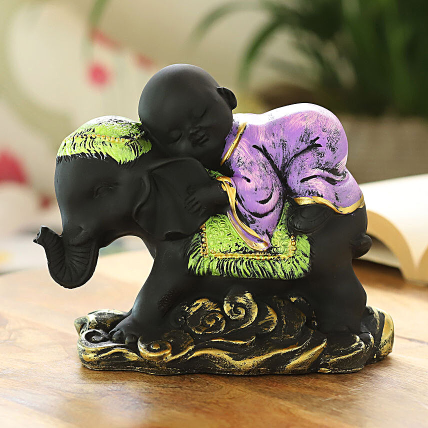 Sleeping Monk On Elephant Idol- Black