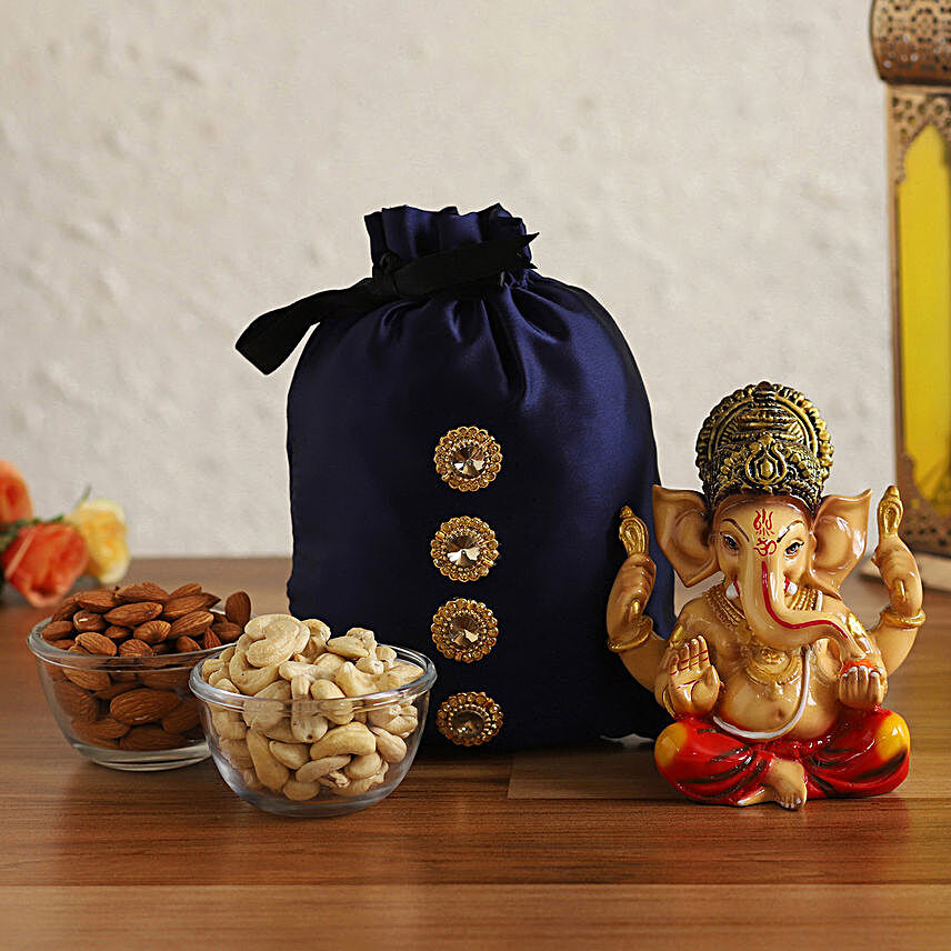 Raja Ganesha Idol With Dry Fruits Potli