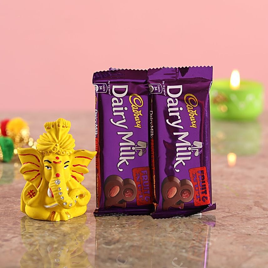 Chocolates With Matte Yellow Ganesha Idol