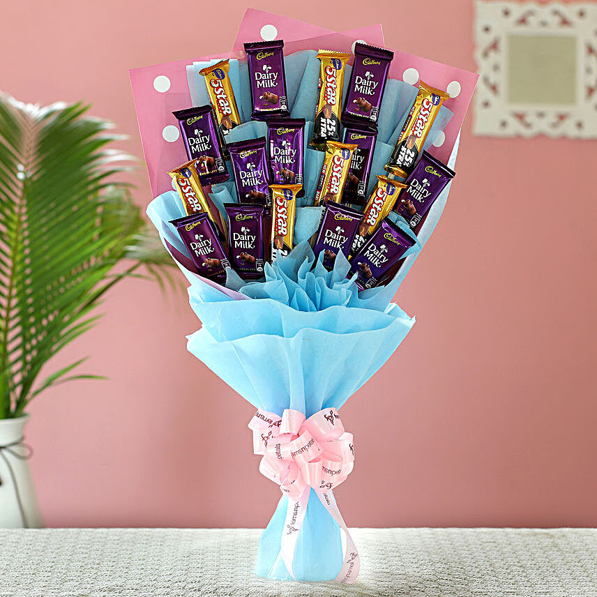 Blue Dairy Milk & 5 Star Bouquet:Send Holi Chocolates