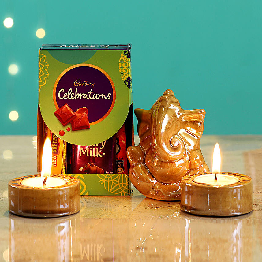 Beige Ganesha Idol & Candles With Cadbury