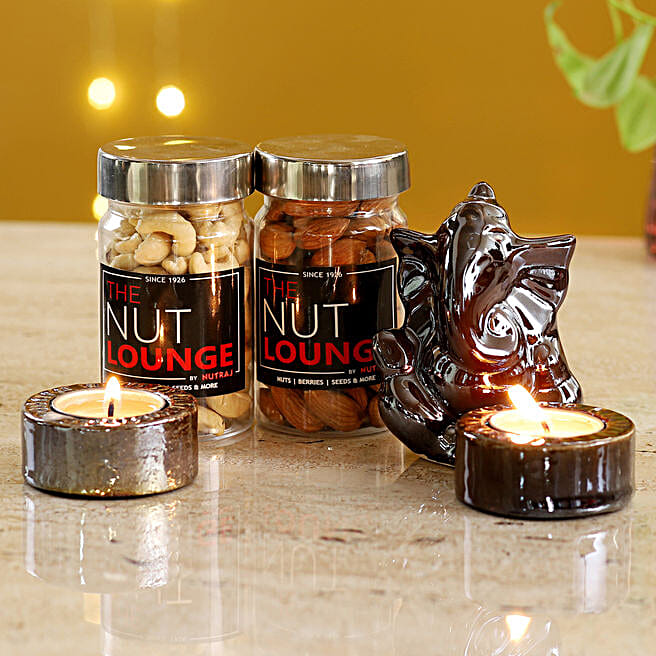 Buy/Send Brown Ganesha Idol & Candles With Dry Fruits Online FNP