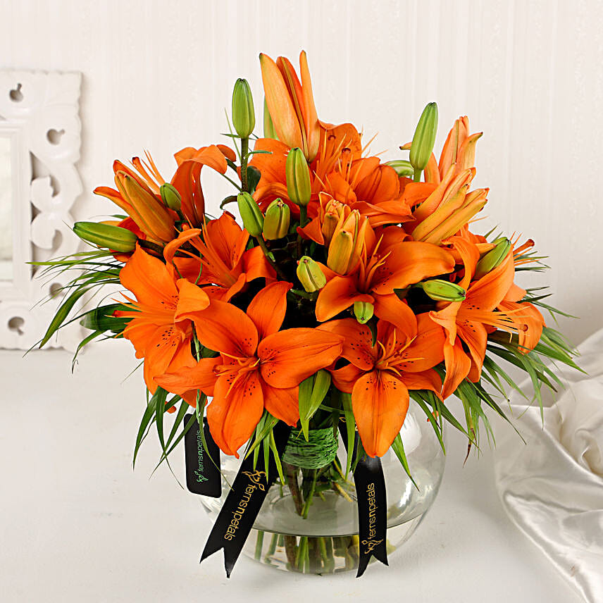 Blissful Orange Lilies In Fishbowl Vase