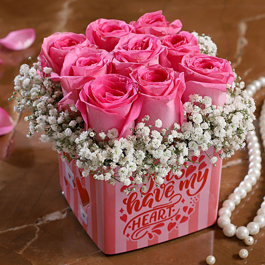 pink rose in vase arrangement for vday