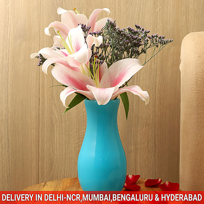 Pink Oriental Lilies In Blue Glass Vase