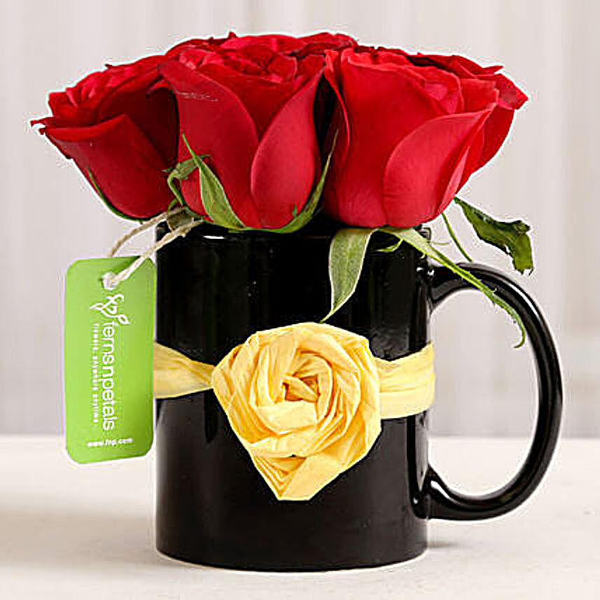 roses arrangement in attractive mug