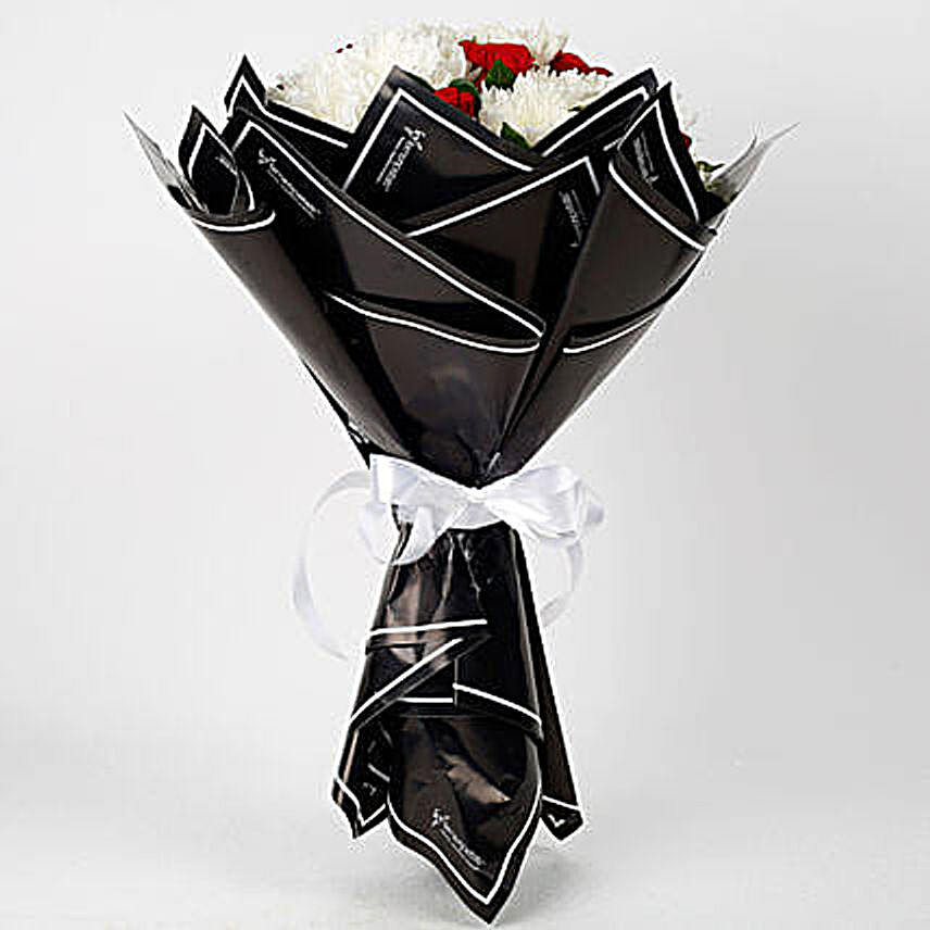 roses and chrysanthemums in black wrapping