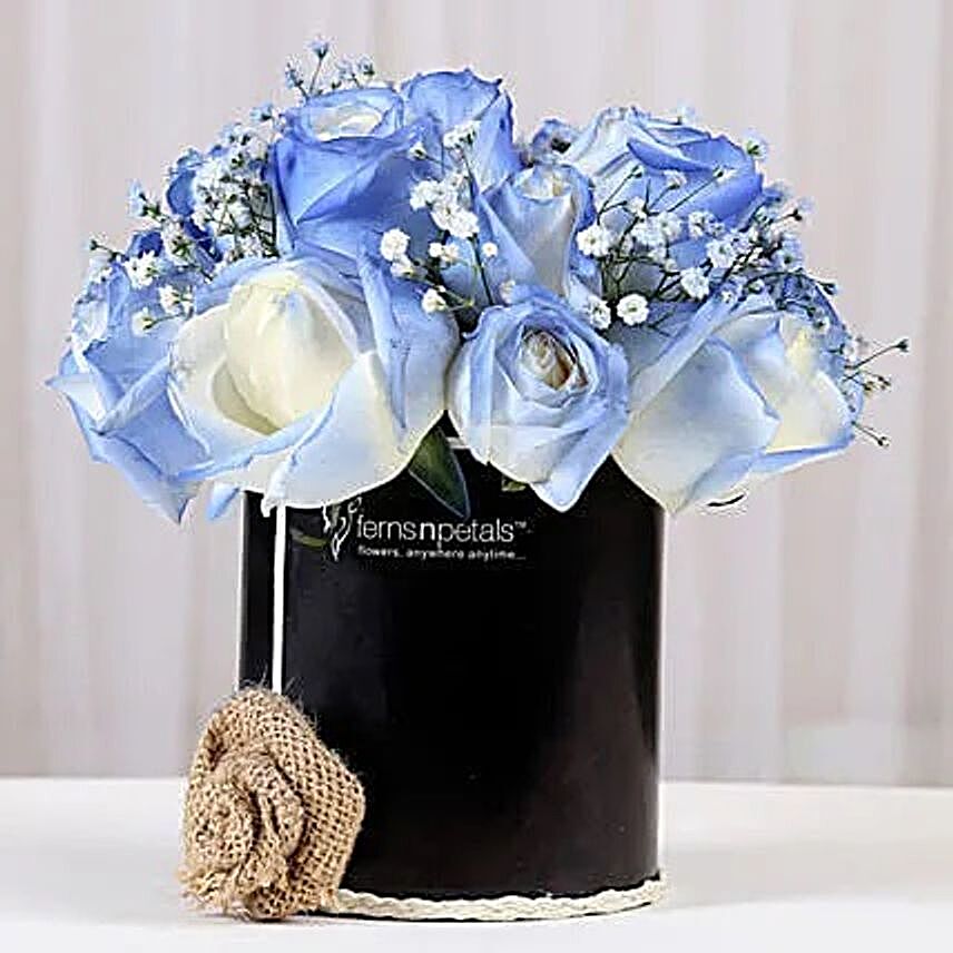 blue roses arrangement in black box