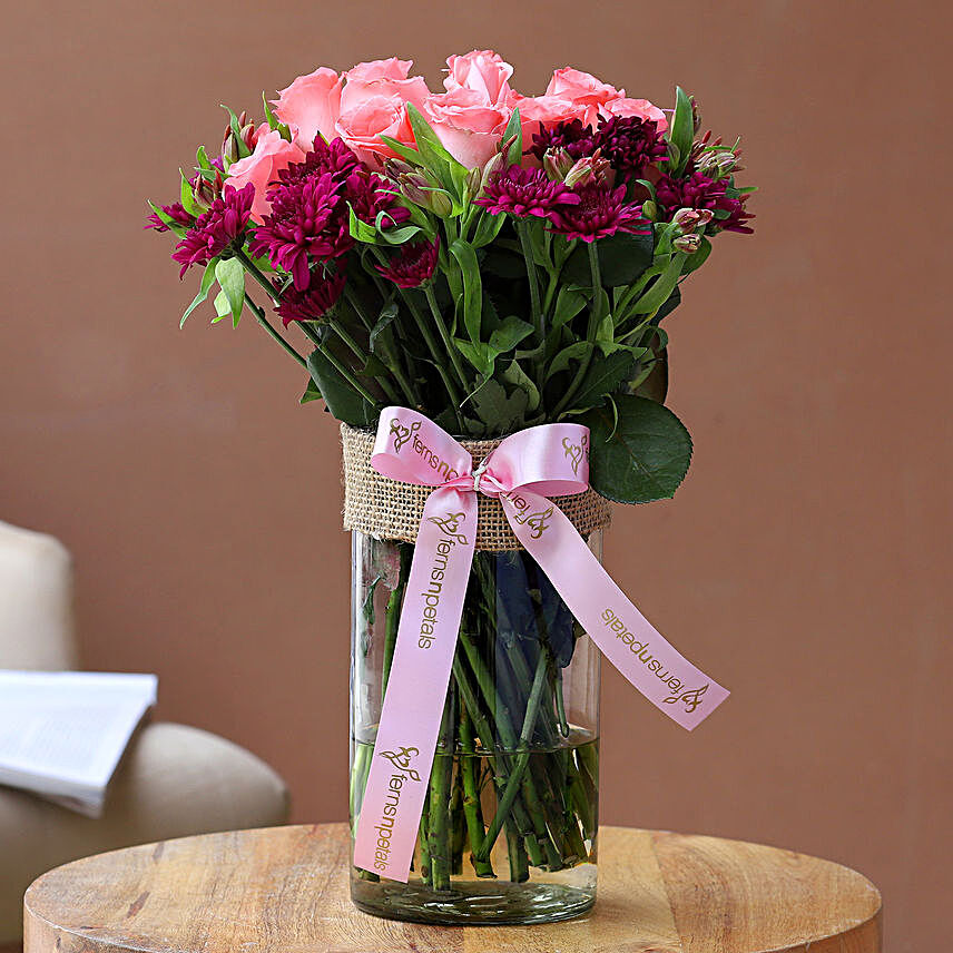 Majestic Mixed Flowers In Pink Ribbon Tied Vase