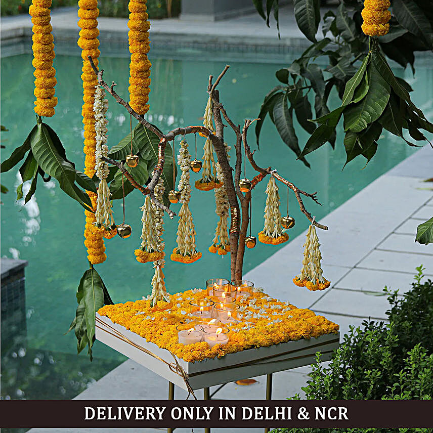 Beautiful Marigold and Candle Arrangement:Diwali Best Seller Gifts