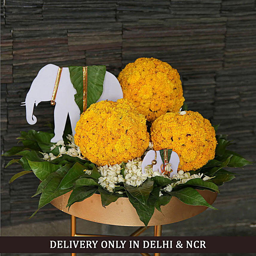 Vibrant Marigold and Elephant Arrangement:Midnight Diwali Gifts Delivery