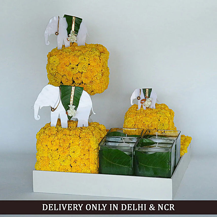 Yellow Marigold and Candle Arrangement:Diwali Best Seller Gifts