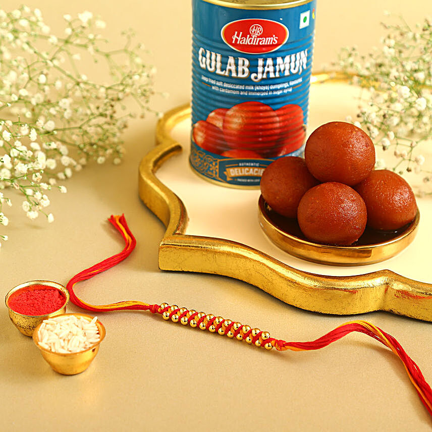 Sneh Golden Beads Mauli Rakhi and Haldiram Gulab Jamun:All Rakhi