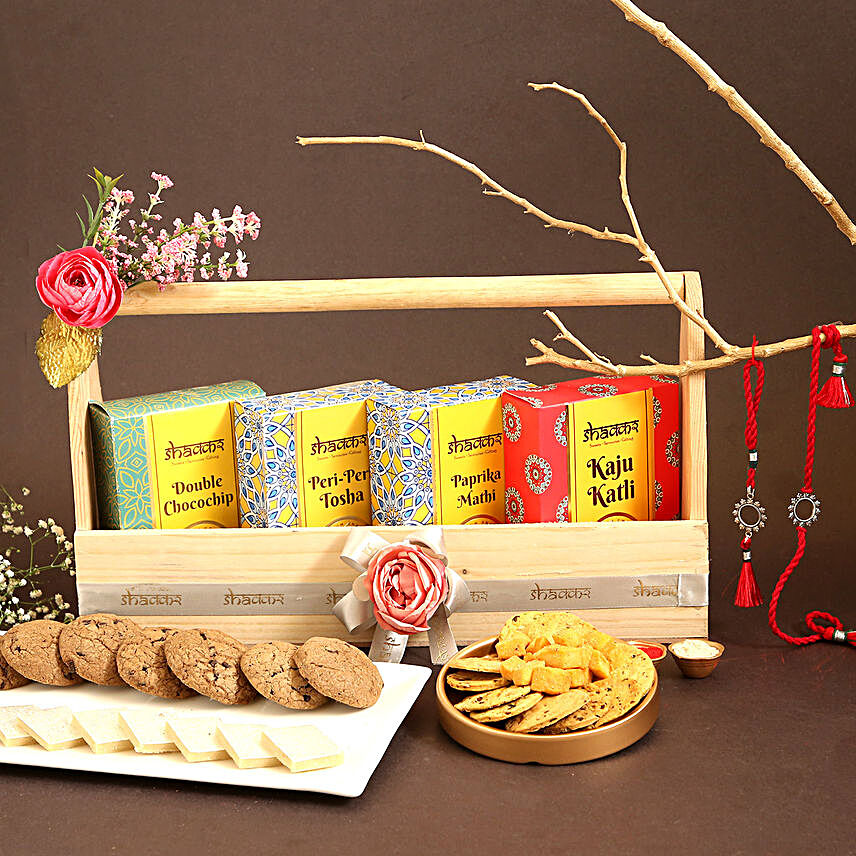 Sneh Floral Bhaiya Bhabhi Silver Rakhi Set With Sweet Savoury Basket