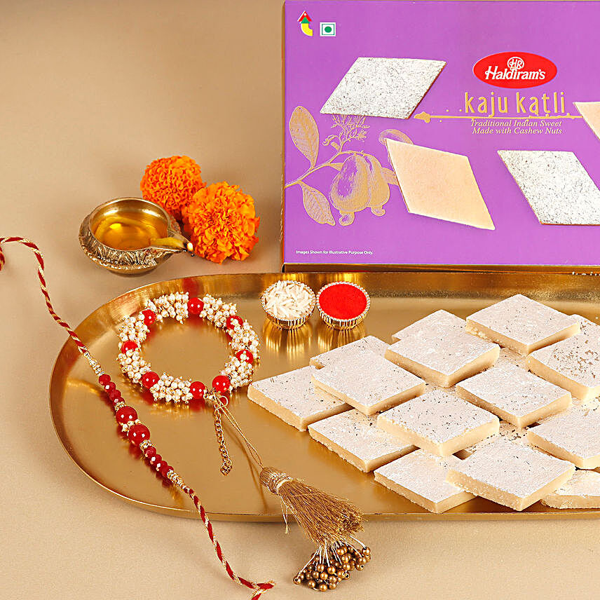 Sneh Red and White Beads Bhaiya Bhabhi Rakhi Set and Haldiram Kaju Katli:Rakhi Gifts For Bhaiya Bhabhi