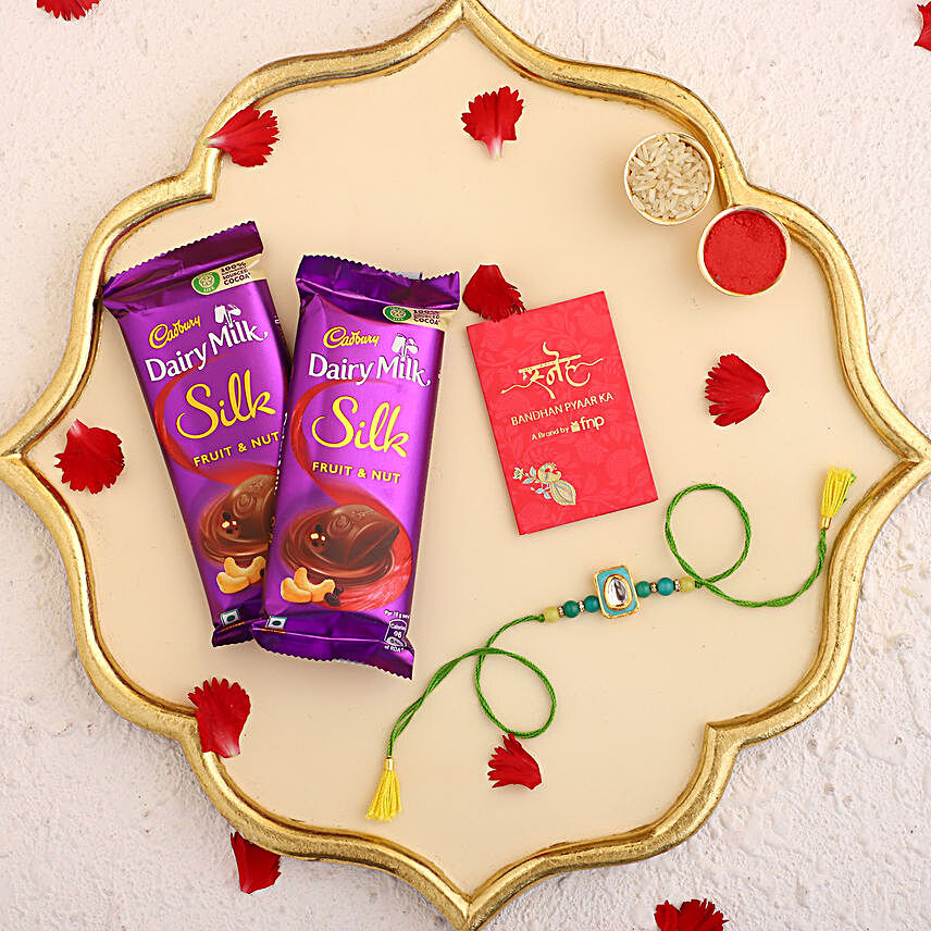 Sneh Golden Phiroza Meenakari Rakhi and Dairy Milk Silk Chocolates:Send Rakhi With Chocolates