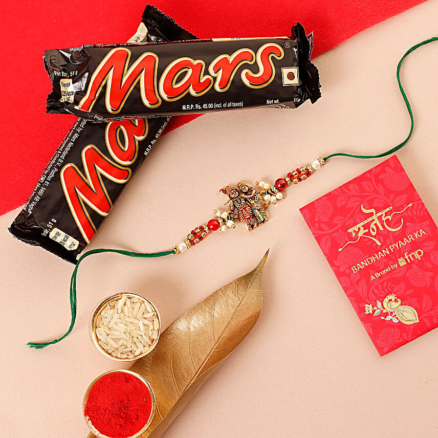 Sneh Golden Radha Krishna Rakhi and Mars Chocolates:Snickers Chocolates