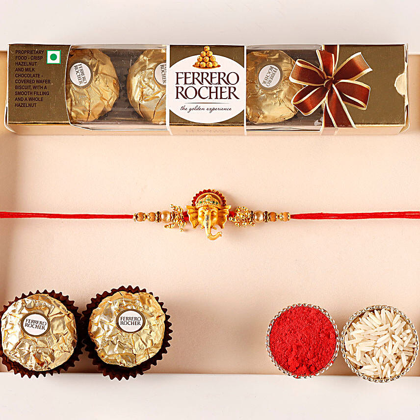 Sneh Golden Ganesha Face Rakhi and Ferrero Rocher