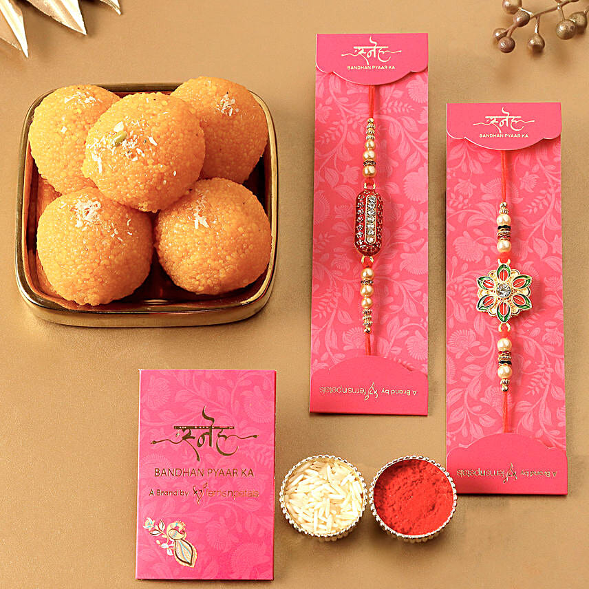 Meenakari Flower & Capsule Rakhi With Motichoor Laddu