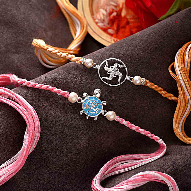 Buy/Send Silver Swastik N Turtle Rakhi Set Online- FNP