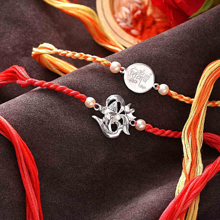 Traditional Om Silver Rakhi Set:Send Set Of 2 Rakhi