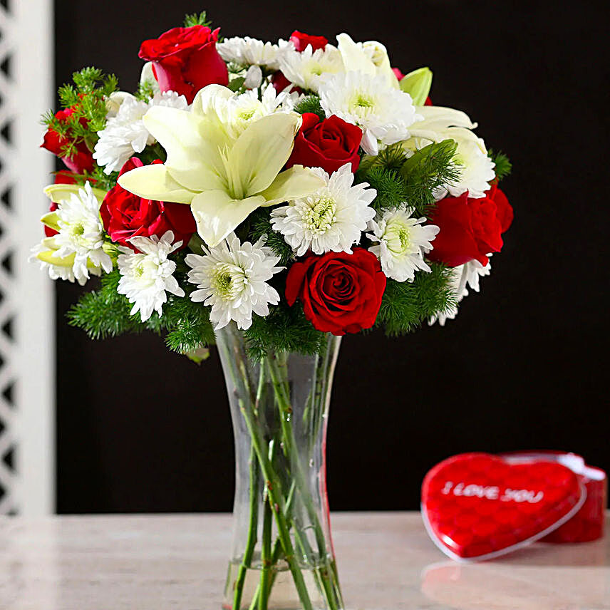 2 mix flower vase arrangement online:Christmas Flowers