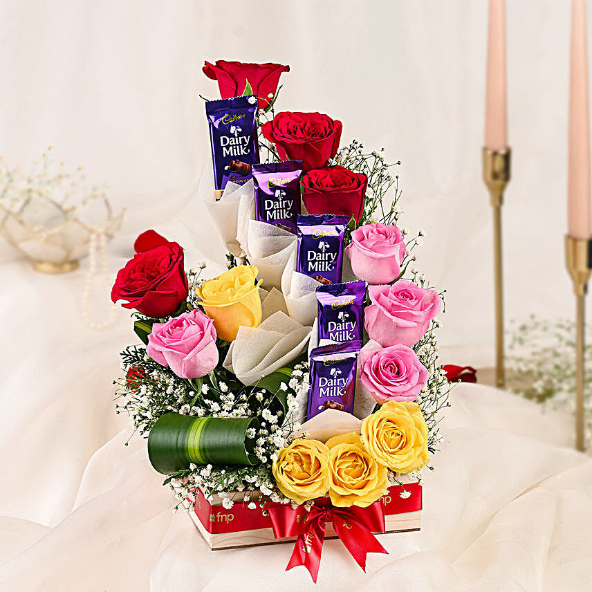 Mixed Roses Arrangement With Dairy Milk Chocolates:Housewarming Gift Ideas