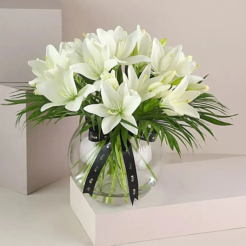 Pure White Asiatic Lilies In Fishbowl Vase