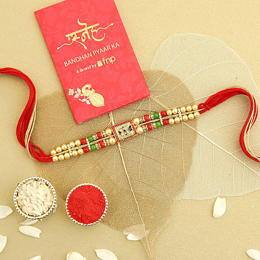 Buy/Send Sneh Kundan Meenakari Alloy Rakhi with Crunchy Nuts Online- FNP