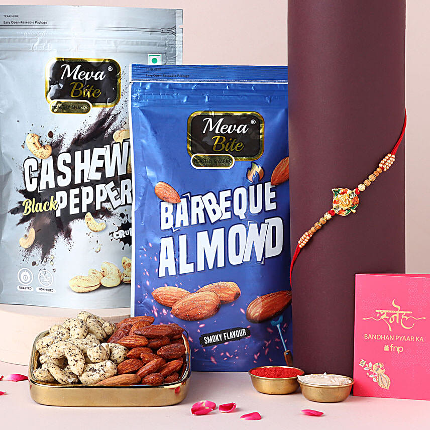 Buy/Send Sneh Meenakari Ganesha Rakhi with Healthy Nuts Online FNP
