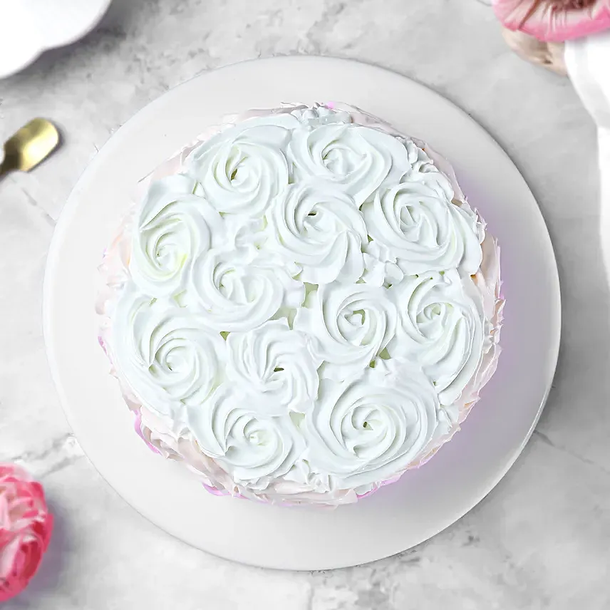 Rosy Hues Pineapple Cream Cake Half Kg Egg