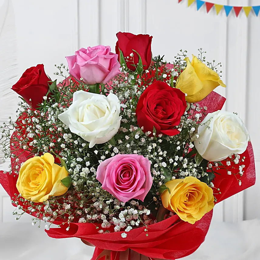 Multicoloured gulal packets, red rose bouquet, gujia hamper
