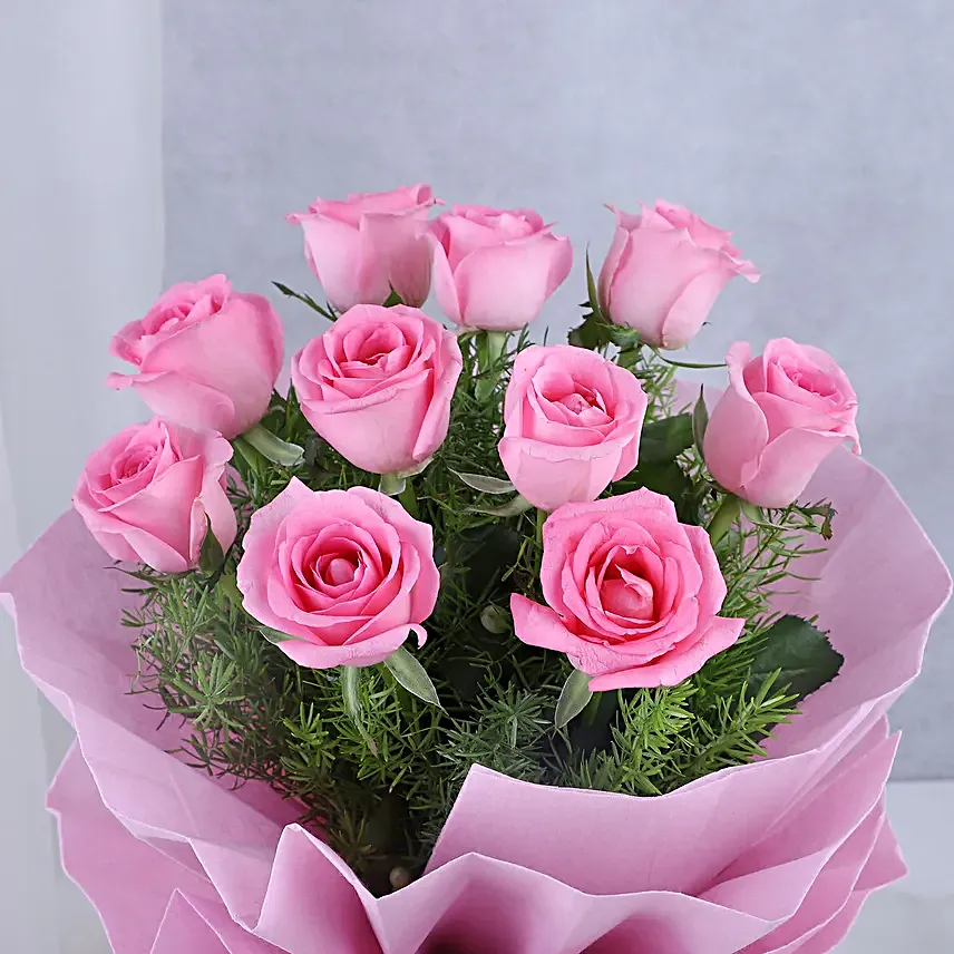 Pink Roses with Cake - Bouquet of 10 pink roses with in paper packing and 500 grams of chocolate truffle cake.