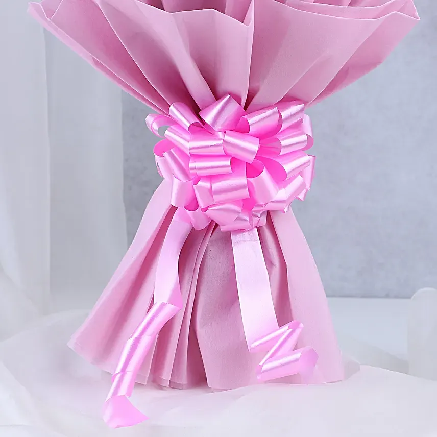 Pink Roses with Cake - Bouquet of 10 pink roses with in paper packing and 500 grams of chocolate truffle cake.