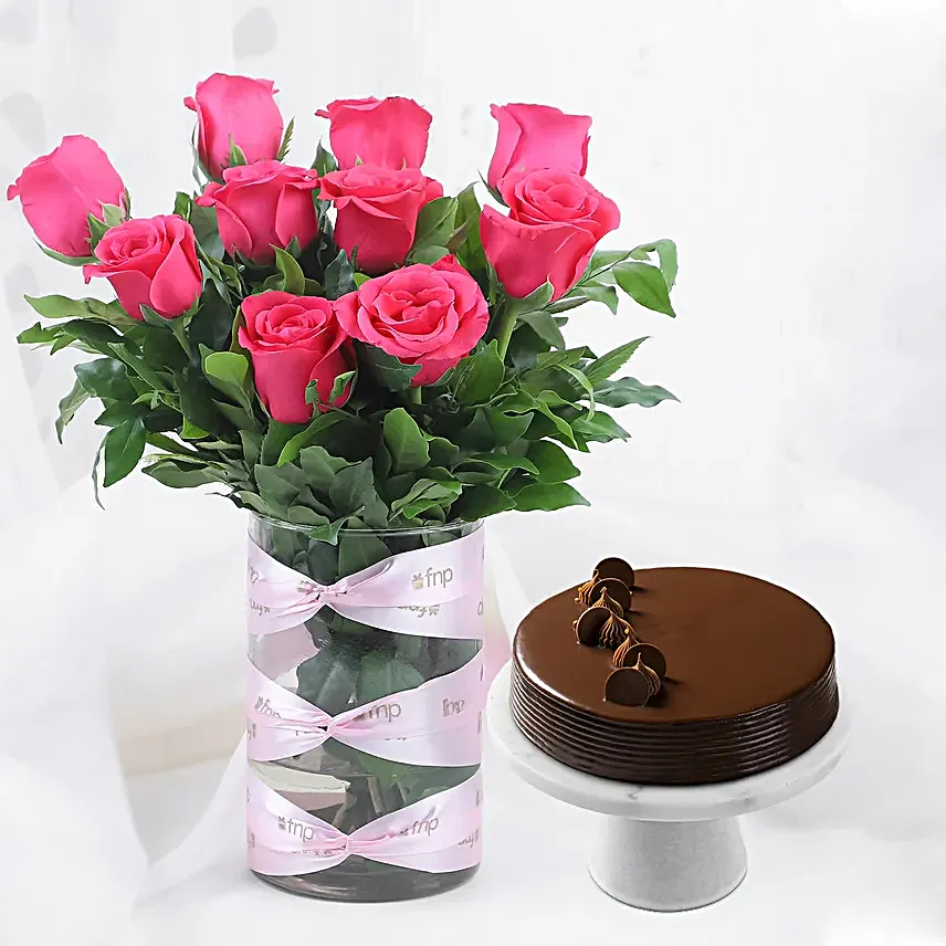 pink roses in attractive vase with truffle cake combo
