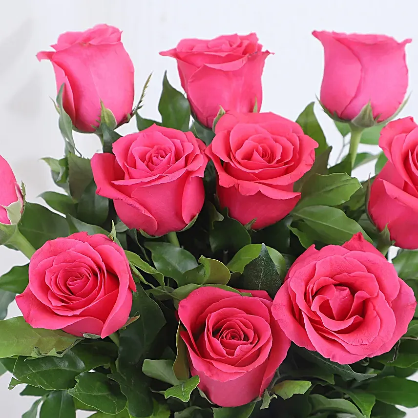 pink roses in attractive vase with truffle cake combo