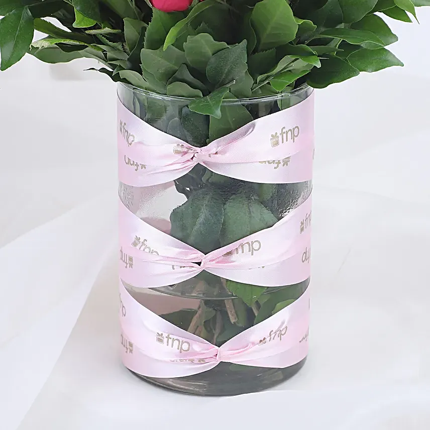 pink roses in attractive vase with truffle cake combo