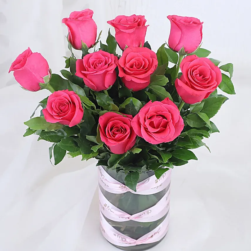 pink roses in attractive vase with truffle cake combo