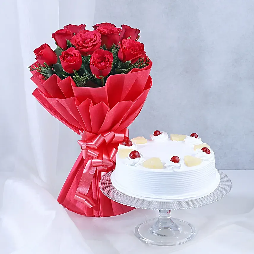 Pineapple Cake with Flowers - Bouquet of 10 red roses and 500 grams of pineapple cake.