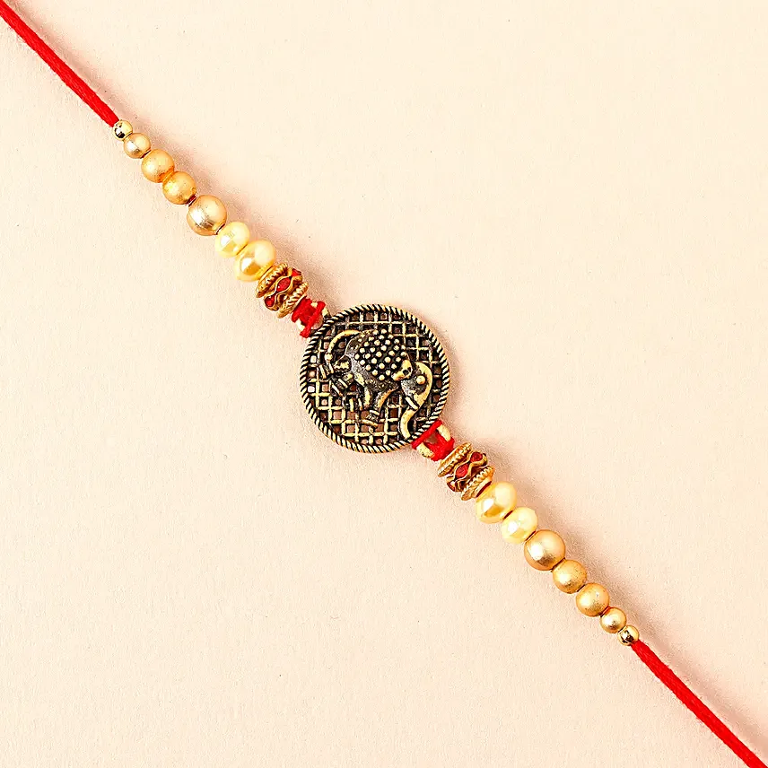 Sneh Single Fancy Nityam Rakhi & Personalised Mug