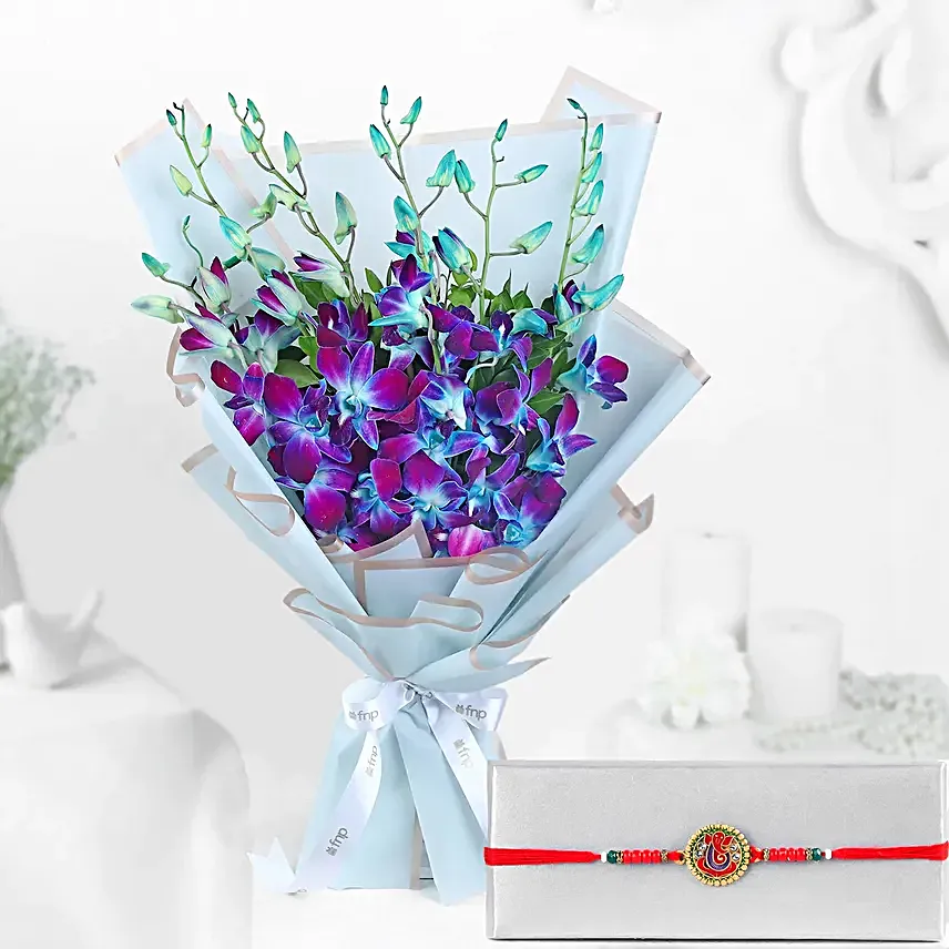 Ganesha Good Omen Rakhi N Ethereal Orchids Bouquet