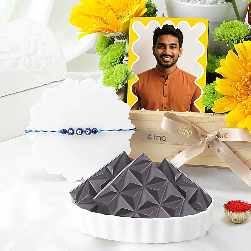 Golden Greens Rakhi Hamper with Florals N Evil Eye