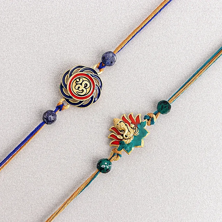 Vibrant Ganesh and Om Rakhi Duo N Sweetness Set