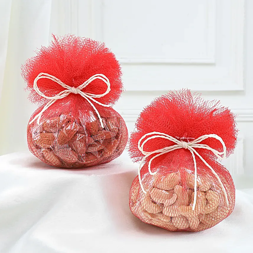 Set of 2 Pearl Rakhi With Celebrations N Dry Fruits