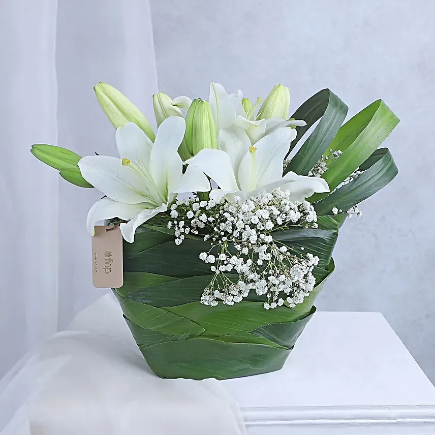 Angel In White Floral Arrangement
