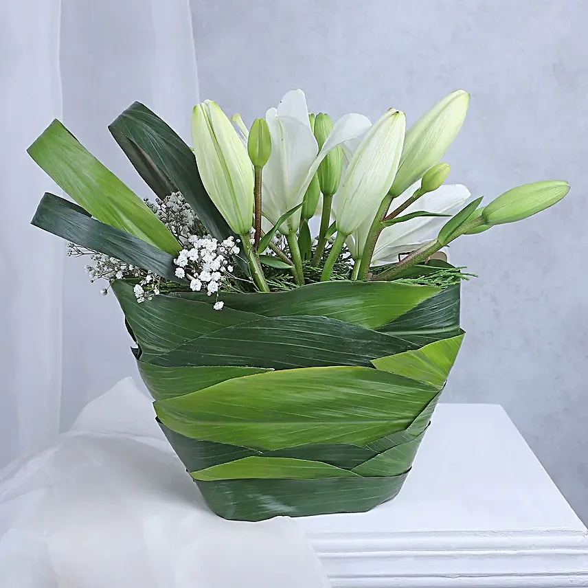 Angel In White Floral Arrangement