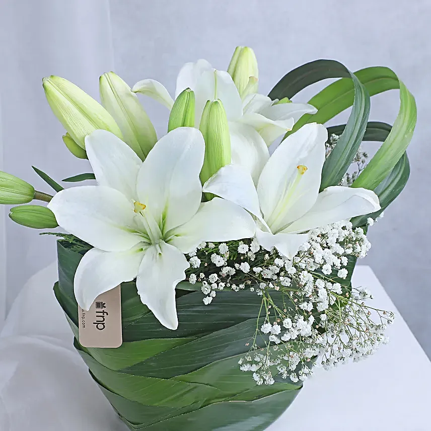 Angel In White Floral Arrangement