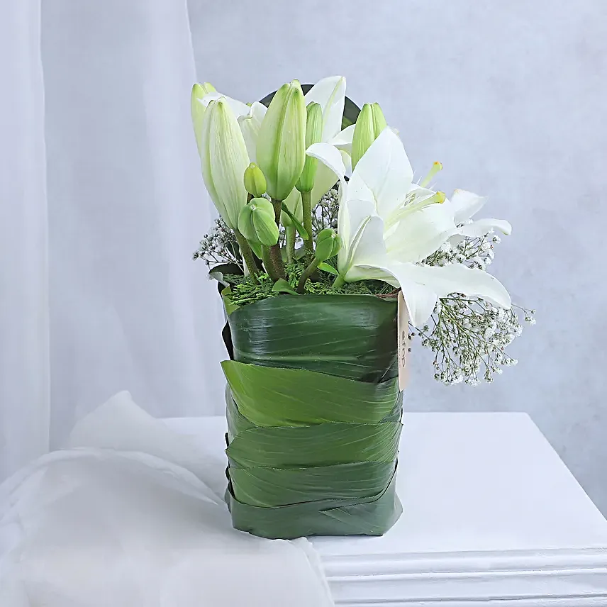 Angel In White Floral Arrangement
